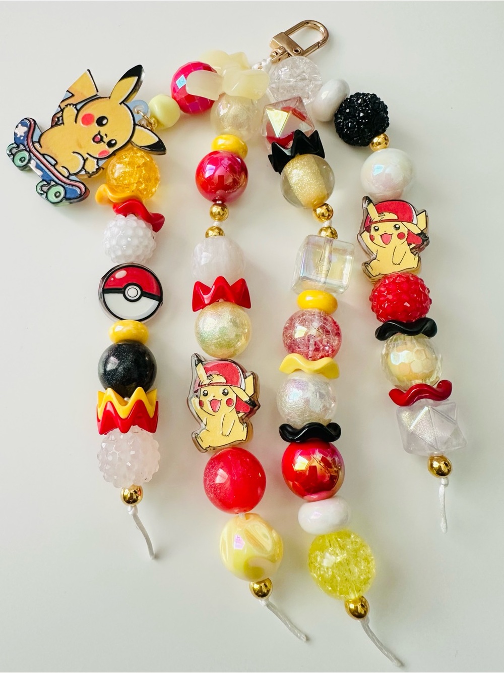 Pokémon Beaded Phone/Bag Charm - Red, Yellow, Black, White